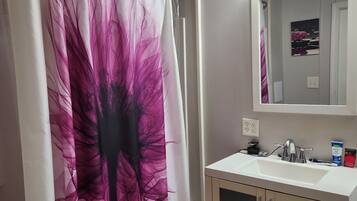 Hair dryer, towels, soap, shampoo