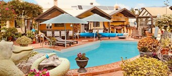 Apartment 1 with panoramic window in the bedroom facing the sea and Risco Famara