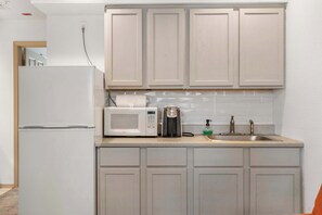 Fridge, microwave, coffee/tea maker, toaster