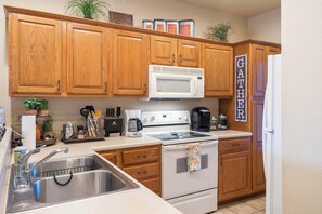 Fridge, microwave, coffee/tea maker, toaster