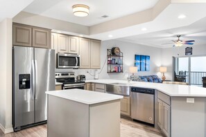 Coffee/tea maker, fridge, microwave, oven