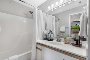 Shower, hair dryer, towels