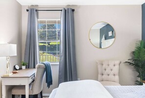 1 bedroom, desk, iron/ironing board, travel crib