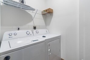 Private laundry is available for your stay, tucked away in a dedicated closet - Two Pines – Endless Views and Attractions! (Branson)