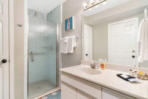 Shower, hair dryer, towels