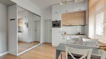 Apartamento conforto | 1 quarto, ferros/tábuas de passar roupa, Wi-Fi de cortesia