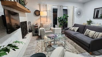 Smart TV, fireplace, books