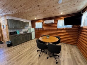 Dining - Charming log cabin on back gravel road with peace, quiet & the amenities of home (Kimbolton)