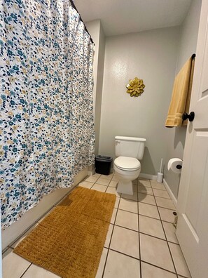 Jetted bath, hair dryer, towels, soap
