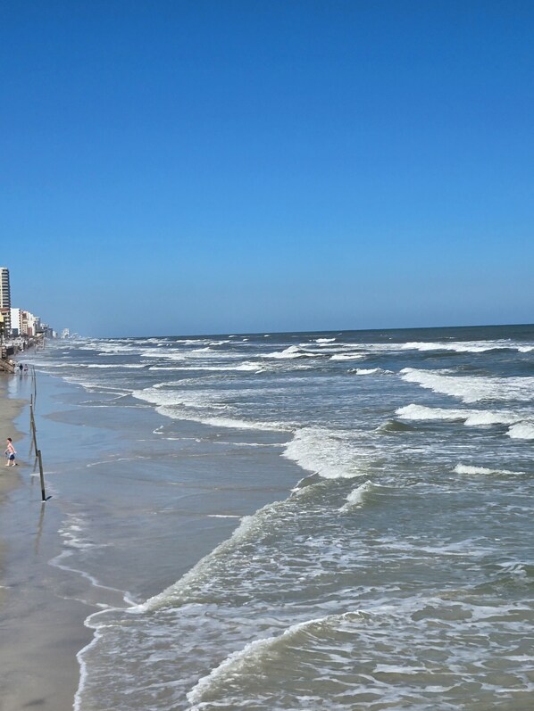 On the beach, sun-loungers, beach towels