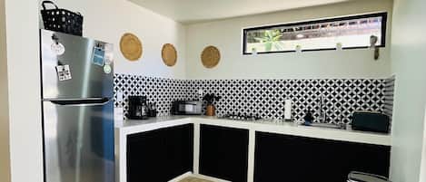 Fridge, microwave, stovetop, coffee/tea maker