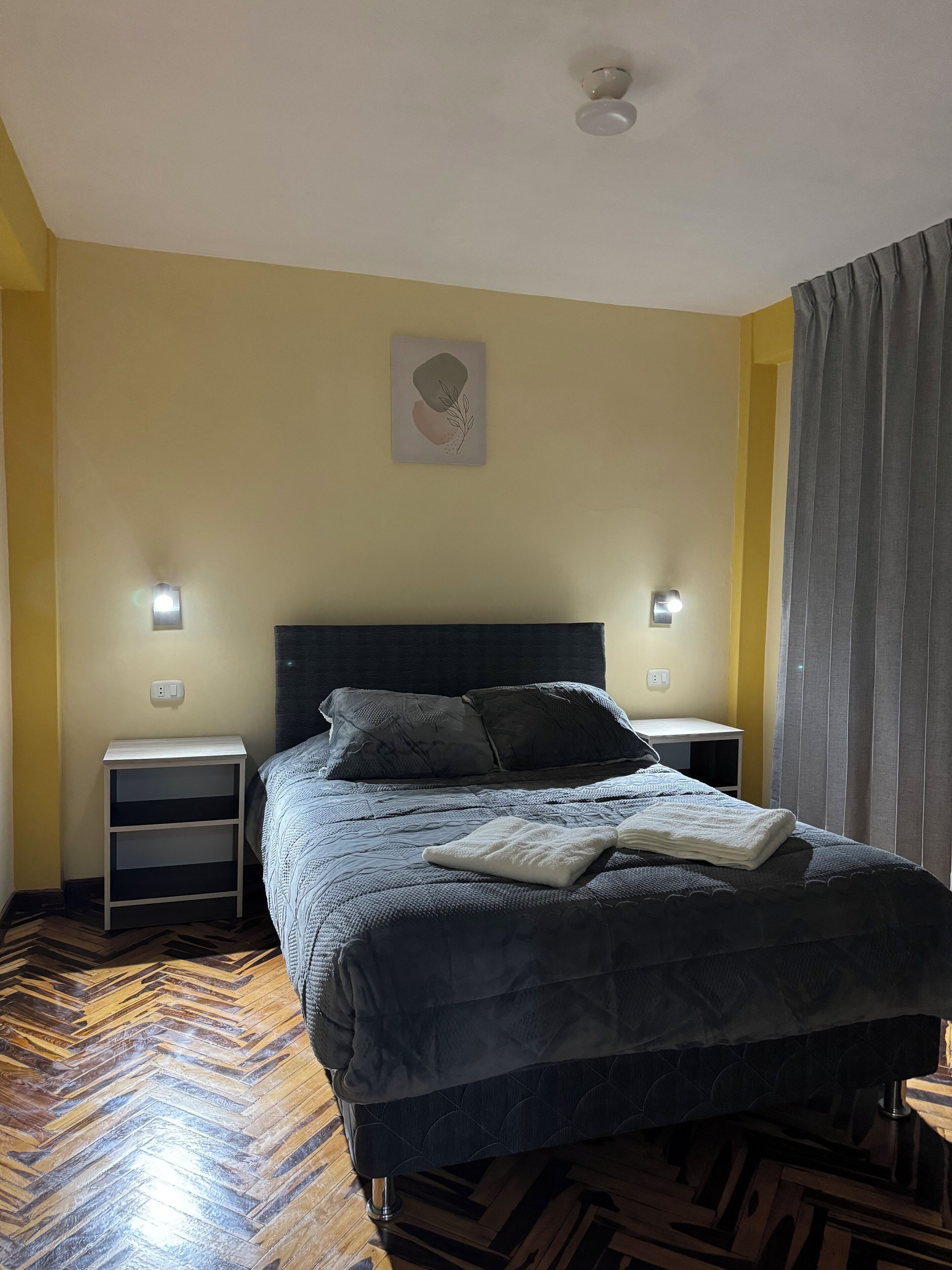 2 habitaciones, tabla de planchar con plancha y internet 