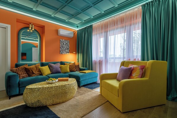 Deluxe Apartment, Balcony, City View | Living area | 42-inch Smart TV with cable channels, Netflix, streaming services