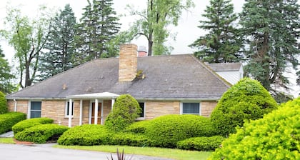Historic Gate Lodge lovingly renovated and fully furnished in quaint Akron