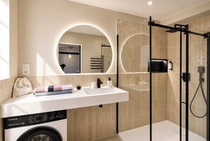 Shower, hair dryer, towels