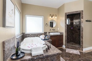 Shower, jetted bath, hair dryer, towels