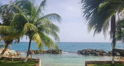 Charming 1-bedroom in Tower Isle St Mary: AC, WiFi, pool, and a serene retreat.