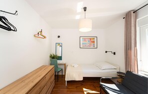 2 quartos, berço de viagem, Wi-Fi de cortesia, roupa de cama