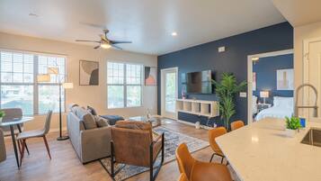 Deluxe Apartment, 2 Bedrooms, Non Smoking, Kitchen | Living area | 55-inch Smart TV with digital channels