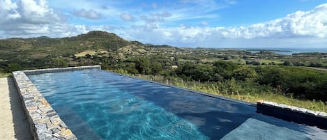 Outdoor pool, open 9:00 AM to 7:00 PM, pool umbrellas, sun loungers