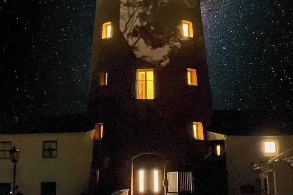 Add a pinch of spookiness to your holidays by watching the Witches Mill in a starry night