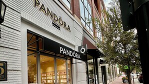 A storefront with a sign reading "PANDORA". -  Stylish loft, centered in the heart of Atlantic station. (Atlanta)