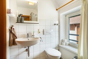Douche, serviettes fournies
