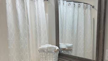 Hair dryer, towels, soap, toilet paper