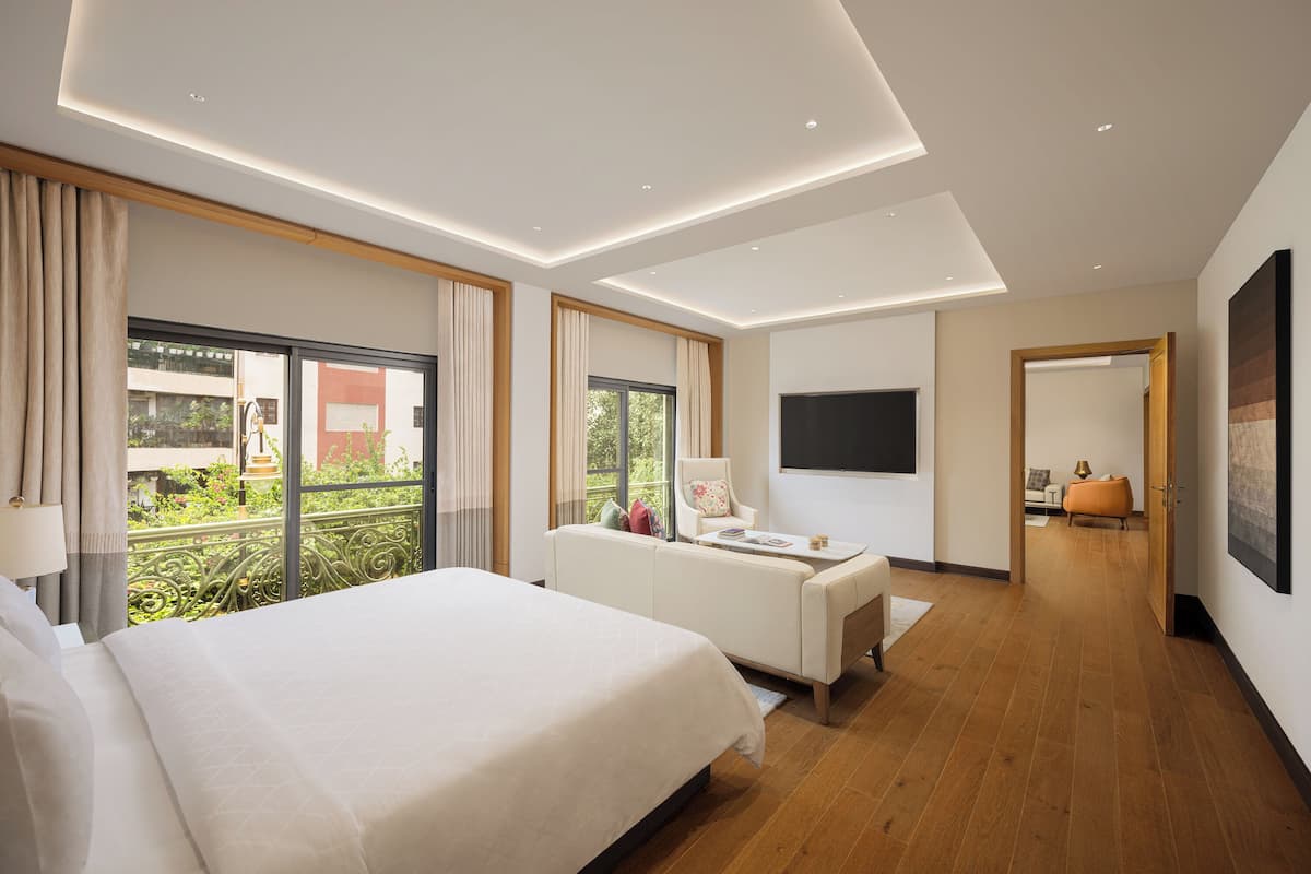 Luxe Queen Room with Balcony | In-room safe, desk, laptop workspace, blackout curtains