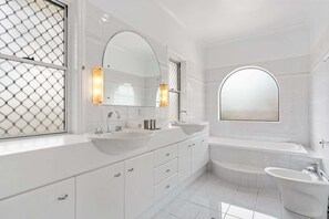 Shower, hair dryer, towels, shampoo