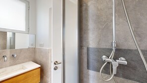 Shower, towels, soap, shampoo