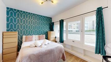 3 slaapkamers, een strijkplank/strijkijzer, wifi, beddengoed