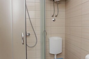 Chuveiro, secador de cabelo
