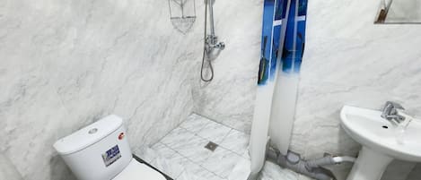 Economy Shared Dormitory, Men only, Non Smoking, Courtyard View | Bathroom | Shower, free toiletries, hair dryer, slippers