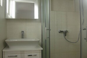 Regadera y secadora de cabello 