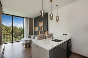 45-inch LED TV with cable channels, Netflix, streaming services - Elite Atoll Serviced Apartments (Rawai)