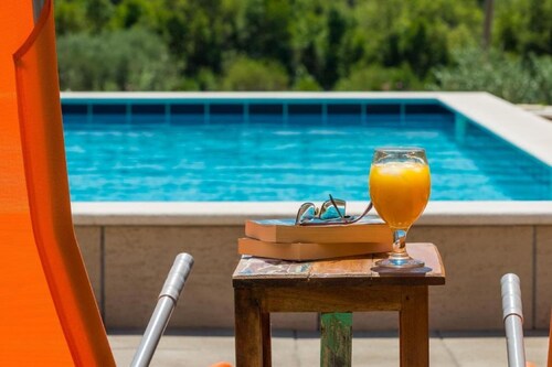 Villa Harmonia with patio and shared pool