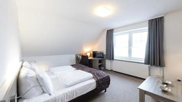 Desk, free WiFi, bed sheets