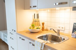 Réfrigérateur, four, plaque de cuisson, lave-vaisselle