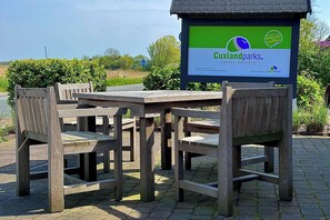 Outdoor dining - Apartment Watt'n Appartement. With sauna and comfort. (Wurster Nordseeküste)