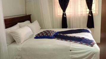 Deluxe Double Room, Balcony | In-room safe, individually decorated, individually furnished, desk