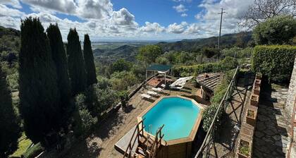Maison en pierre Ă Chiatri avec vue sur lac