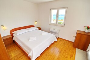 2 chambres, fer et planche à repasser, lit parapluie, Wi-Fi gratuit
