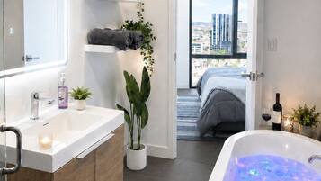 Superior Condo, Balcony, City View | Bathroom | Shower, hair dryer, towels, soap