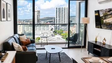 Deluxe-Apartment, Balkon, Stadtblick | 1 Schlafzimmer, Verdunkelungsvorhänge, Bügeleisen/Bügelbrett