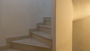 A set of beige stairs leading upwards, with a plain wall on one side and a plain wall on the other. - Apartments Ivana Old Town -Superior Studio - APT2 (Dubrovnik)