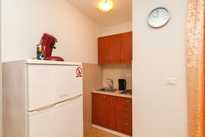 Fridge, stovetop, dining tables