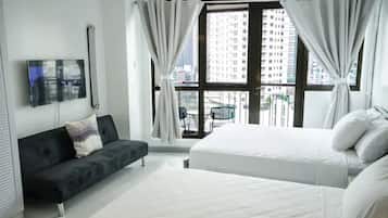 Suite estudio Confort, balcón, vista a la ciudad | 1 habitación, tabla de planchar con plancha y wifi gratis
