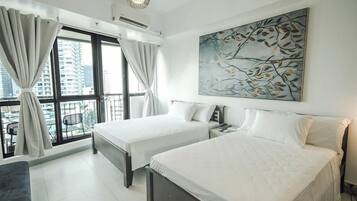 Suite Studio Confort, balcon, vue ville | 1 chambre, fer et planche à repasser, Wi-Fi gratuit