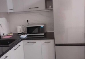 Refrigerador, microondas, horno, placa de cocina